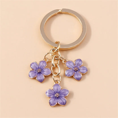Bijou de Sac Fleurs Émaillées Verger — Modèle F