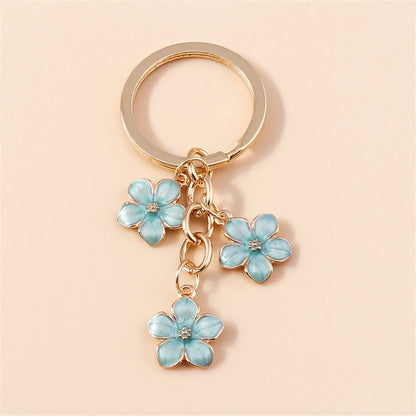 Bijou de Sac Fleurs Émaillées Verger — Modèle H